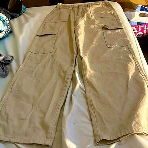 Tan cargo jeans with white stitching